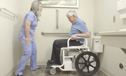 MedaChair™ Freedom - Safely Lowers & Lifts patients for Caretakers. Rolls through any door and over any commode